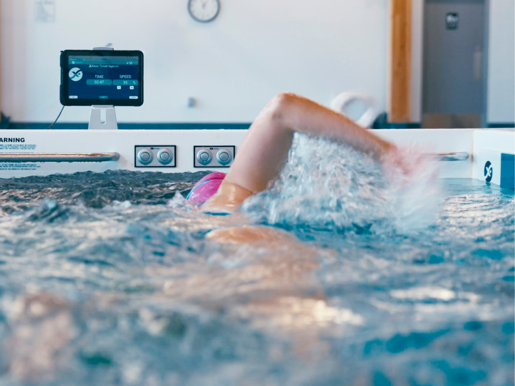 River Valley Club swimmer with tablet